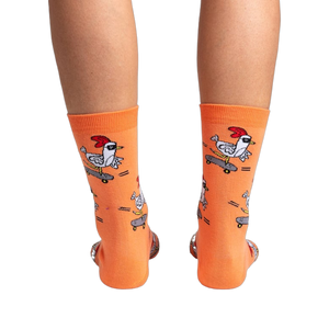 Back view of the Rad Chicken socks on a person's legs, highlighting the design from behind.