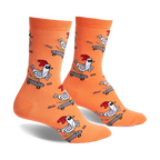 Pair of orange crew socks with a repeating pattern of chickens skateboarding.  The chickens wear sunglasses and red combs.