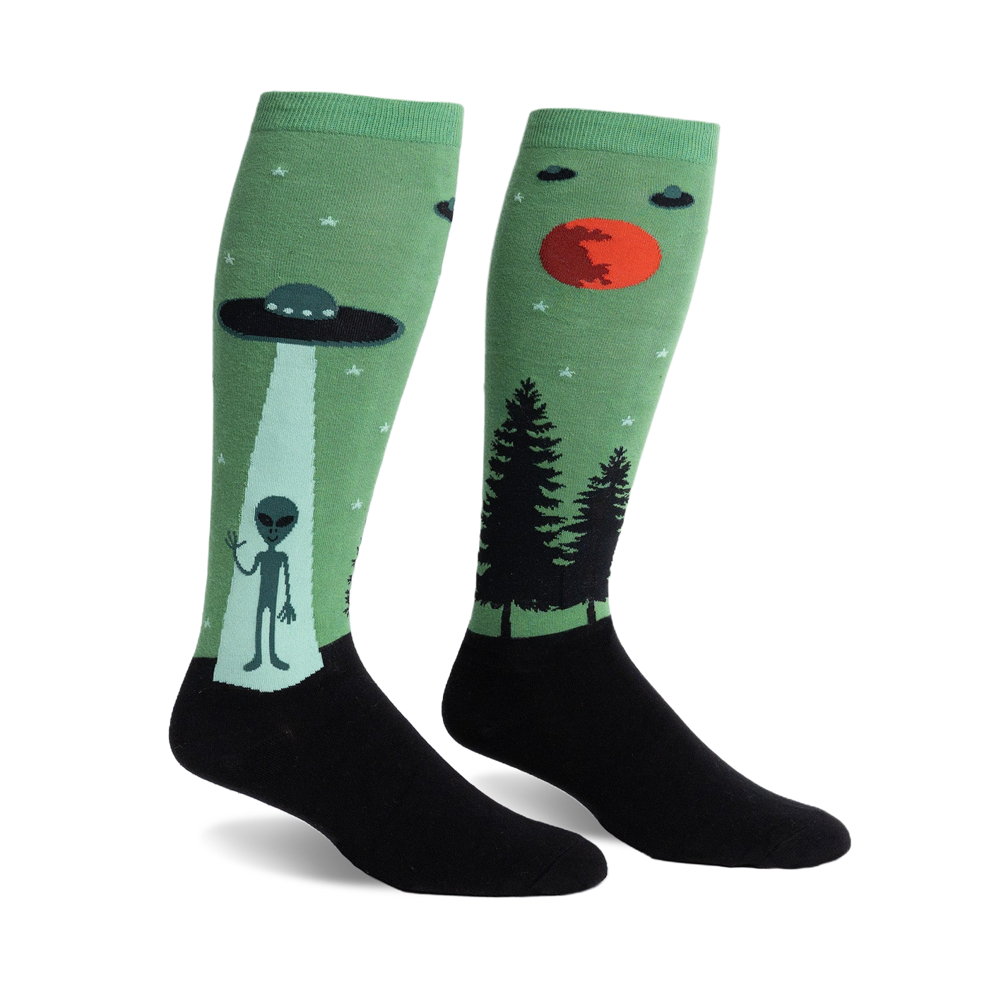 Pair of green and black knee-high socks featuring an alien, UFO, and forest scene.  