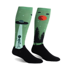 Pair of green and black knee-high socks featuring an alien, UFO, and forest scene.  