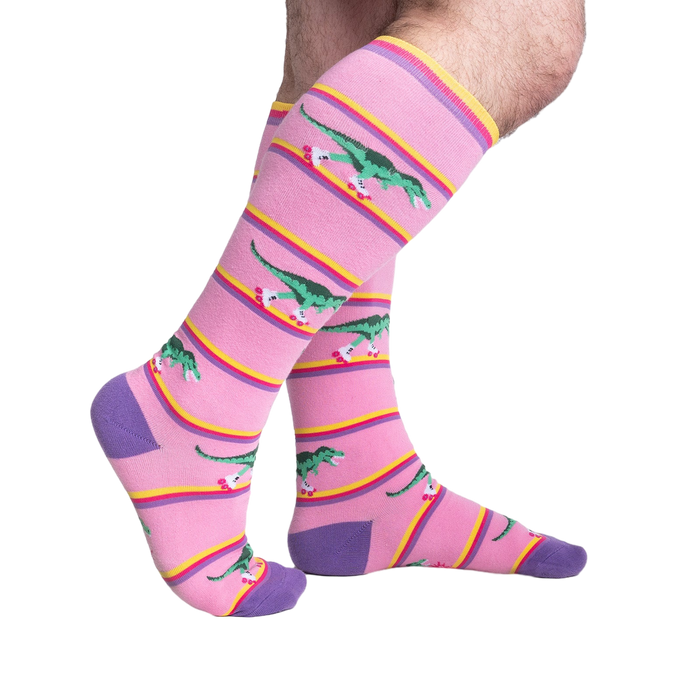 Lifestyle shot showing Rawr-ler Rink socks on a person's legs, showcasing the fit and pattern.