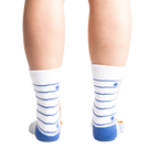 Back view of 'I Love Books' socks worn on model's feet, showing sock's back design and fit.