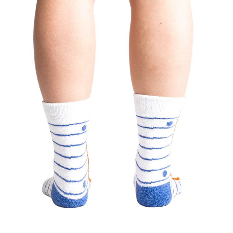 Back view of 'I Love Books' socks worn on model's feet, showing sock's back design and fit.