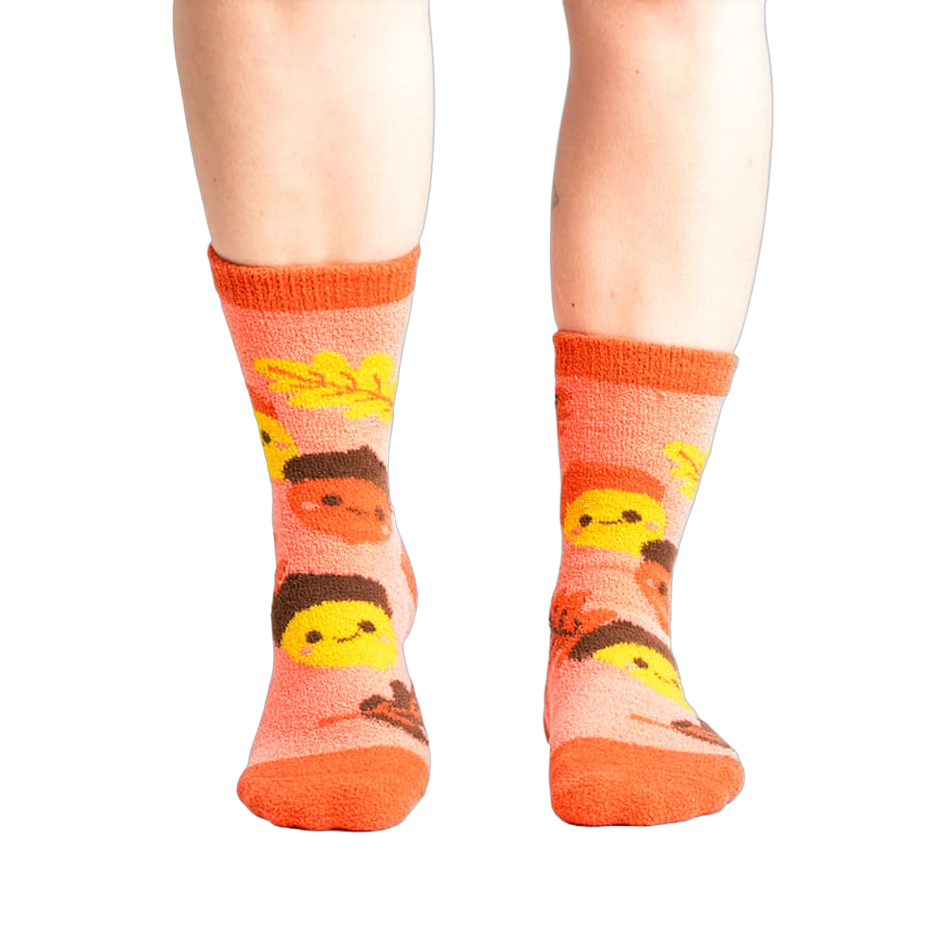 Lifestyle shot: Person wearing coral Acorn-ey socks. Shows how the socks fit.