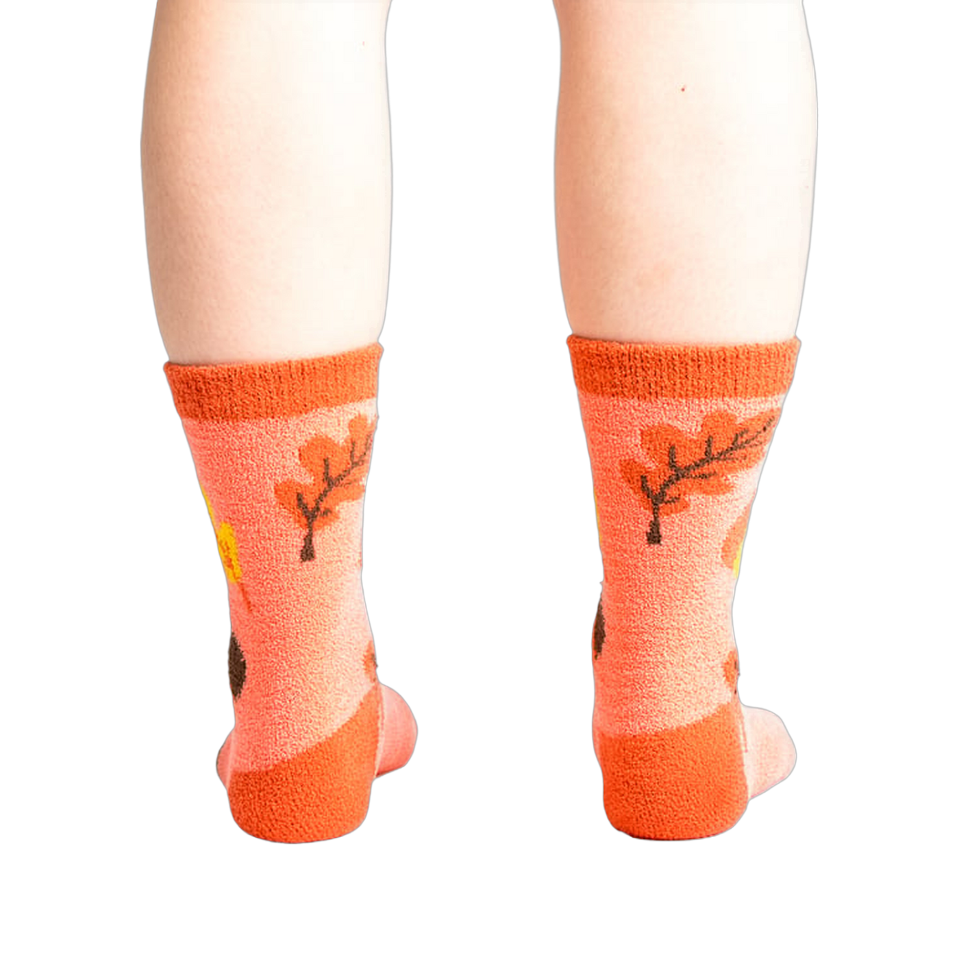 Front view: Pair of coral Acorn-ey socks on a white background.