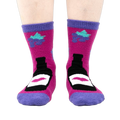 Close-up of 'You Are Really Grape' socks on a person's feet, showcasing the design and fit.