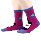Another view of the 'You Are Really Grape' socks on a person's feet, from the side.