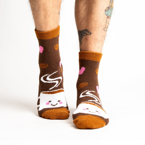 Lifestyle photo showing the socks on a person's feet. 
