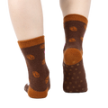 Back view of the socks highlighting the brown fuzzy texture and non-slip grip.