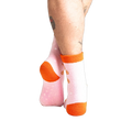 Close-up shot of the back of the pink gingerbread slipper socks.