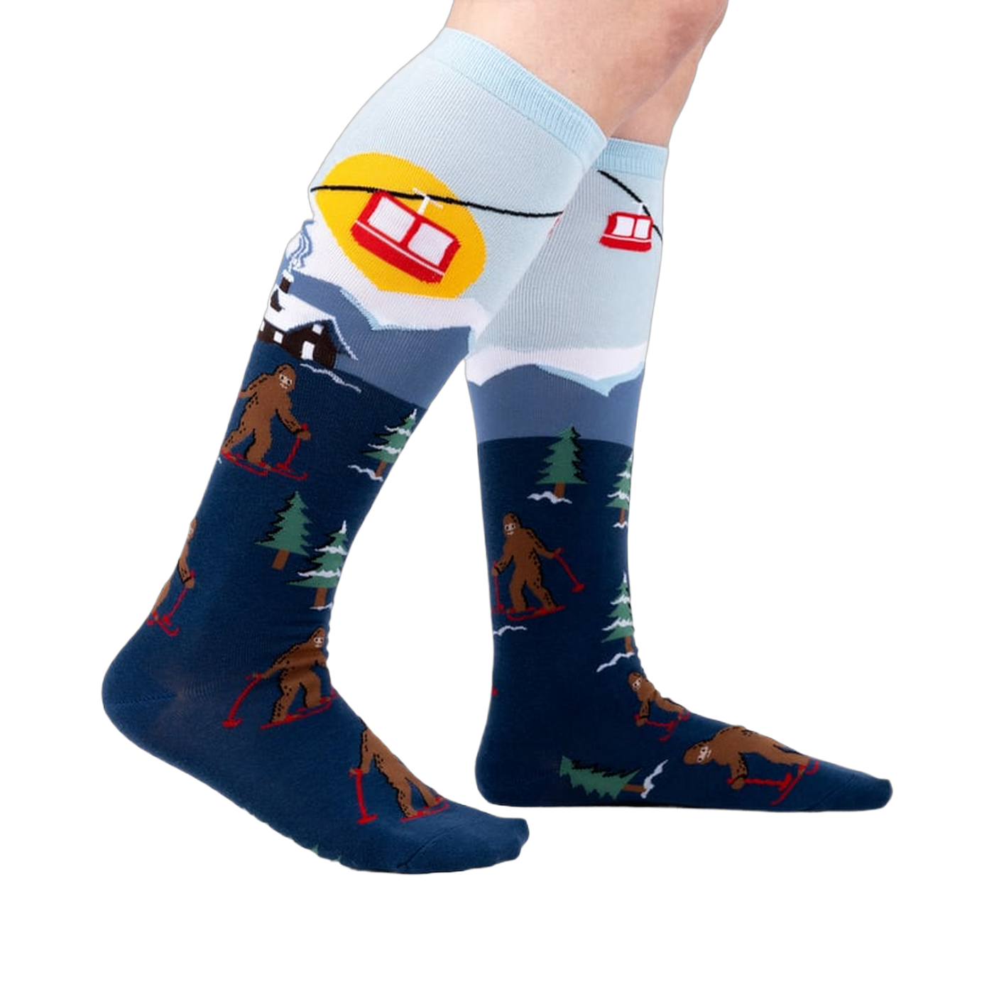 Lifestyle shot: Model wearing the Bigfoot skiing socks, showing the full design.