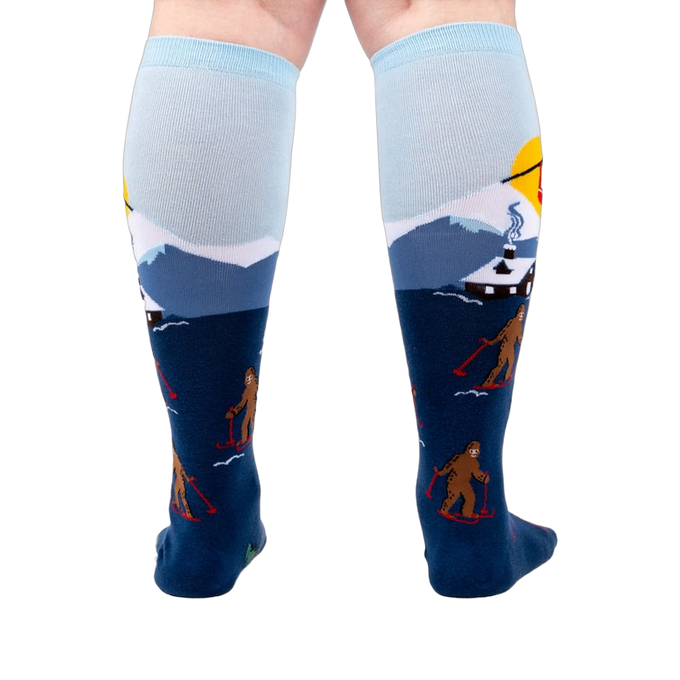 Back view of the socks on a model's legs, showcasing the complete winter scene.