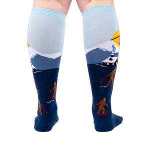 Back view of the socks on a model's legs, showcasing the complete winter scene.