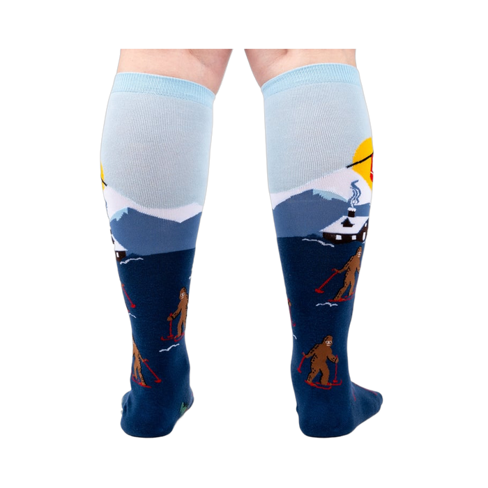 Back view of the socks on a model's legs, showcasing the complete winter scene.