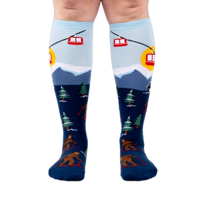 Front view of the socks on a model, highlighting the colorful design and fit.
