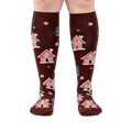 Front view of the socks on a person's legs, highlighting the full design.