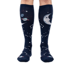 Front view of Moonshadow socks on a model's legs, highlighting the celestial print.