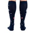Back view of the Moonshadow socks on a model's legs, showing the design on the back of the socks.
