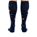 Back view of the Moonshadow socks on a model's legs, showing the design on the back of the socks.