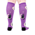 Back view of the socks on a person's legs showcasing the complete design.