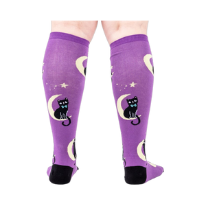Back view of the socks on a person's legs showcasing the complete design.