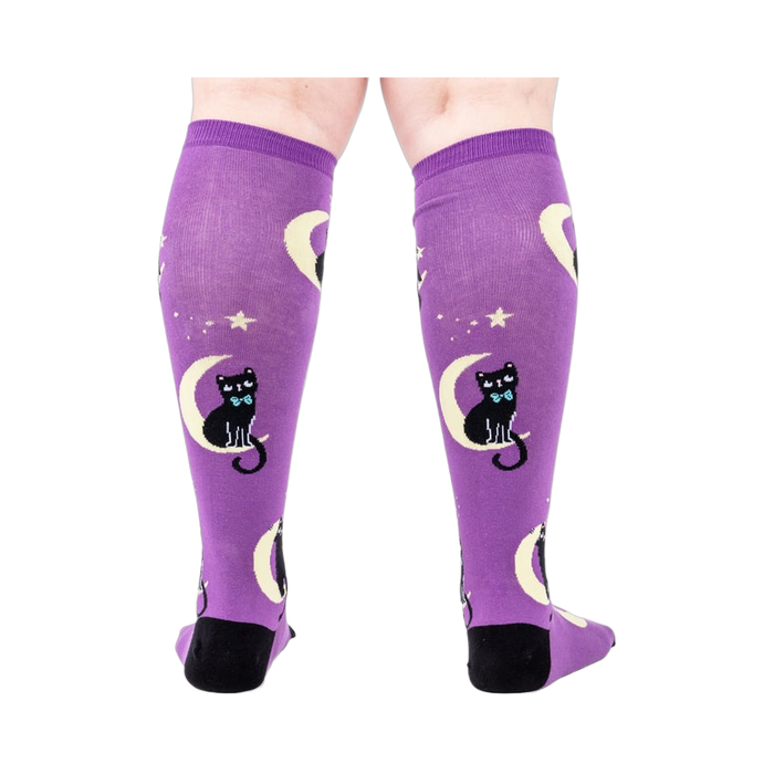 Back view of the socks on a person's legs showcasing the complete design.