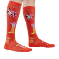 Lifestyle shot showing the 'Herding Cats' socks on a person's legs.
