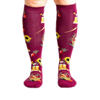 Lifestyle shot of model wearing Autumn Harvest knee-high socks.