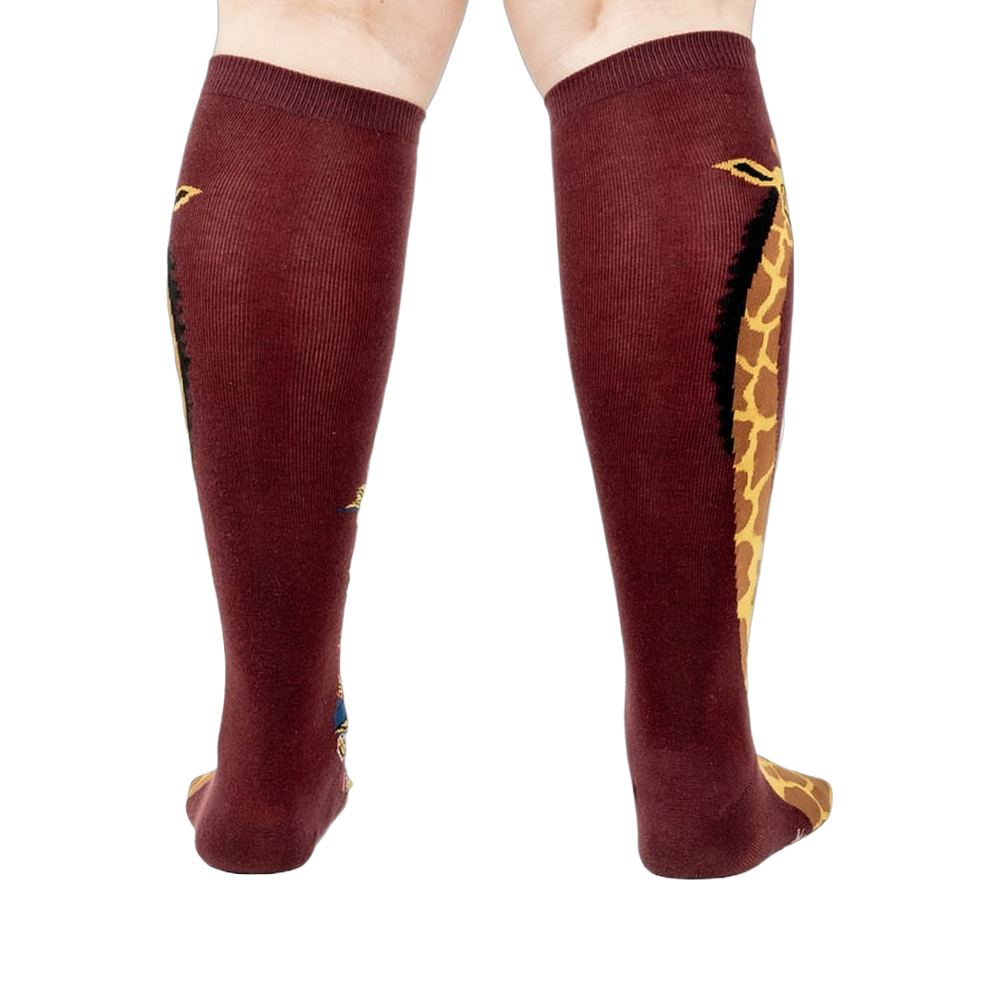 Back view of the socks, highlighting the giraffe design on both socks.