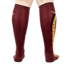 Back view of the socks, highlighting the giraffe design on both socks.