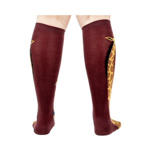 Back view of the socks, highlighting the giraffe design on both socks.