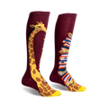 Pair of burgundy knee-high socks. One sock has a giraffe's neck & head; the other, a stack of colorful books.