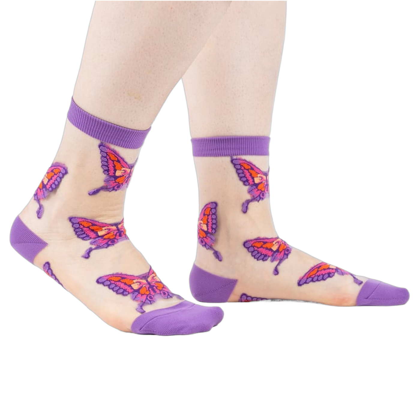 Sheer ankle socks in nude with purple cuffs and colorful butterfly designs. 