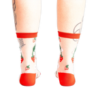 Back view of the strawberry socks, showing the design detail and the red-trimmed ankle.