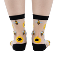 Back view of the sheer sunflower and bee socks, showing the design on the back of the socks.