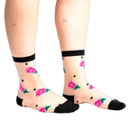 Product shot: Pair of sheer socks with pink roses and black polka dots on a white background.