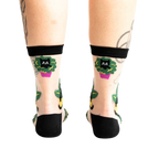 Rear view of the socks on a person's legs, emphasizing the back design.
