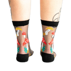 Back view of the 'Made of Magic' mushroom socks, showcasing the design on the heel and sides.
