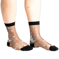 Pair of black sheer ankle socks with a whimsical design featuring a crescent moon, planets, and stars in shades of teal and coral.