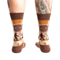 Rear view of the Bigfoot socks on a person's legs.