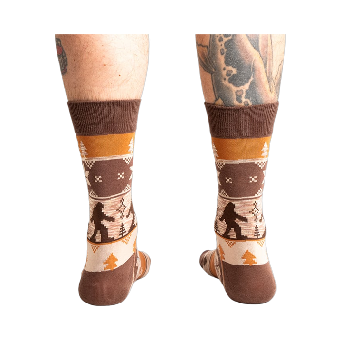 Rear view of the Bigfoot socks on a person's legs.