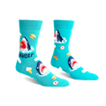 Pair of teal crew socks with a graphic design of a hungry shark surrounded by pizza, ice cream, and burgers.