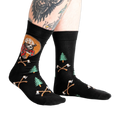 Lifestyle shot of Bear Necessities socks on a person's legs.