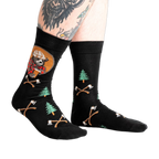 Lifestyle shot of Bear Necessities socks on a person's legs.