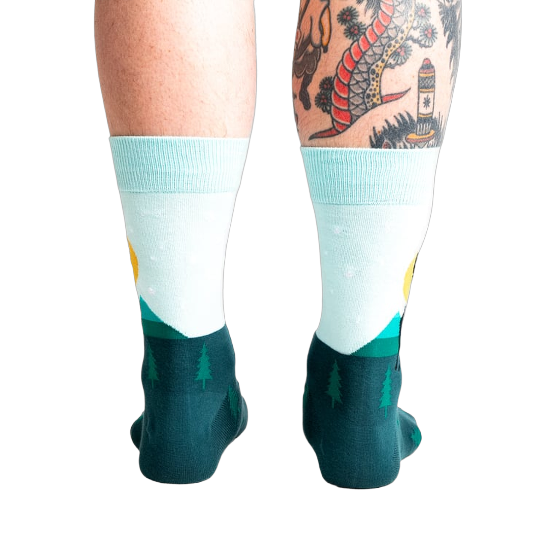 Back view of the Star Buck socks on a person's legs, highlighting the design's continuation around the heel and ankle.