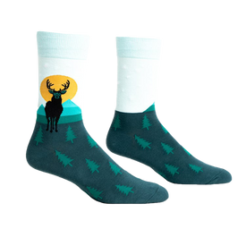 front view of a pair of socks with a deer and sunset graphic. the socks are teal with green trees.