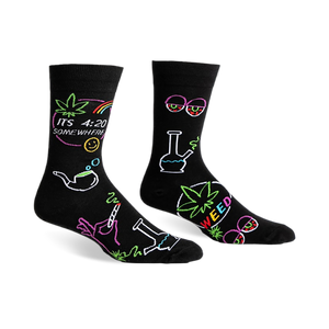 Black crew socks with a fun, colorful design featuring cannabis leaves, bongs, and the phrase 'It's 4:20 Somewhere'.