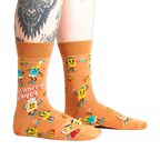 Lifestyle shot of a person wearing the 'Don't Worry, Be Hoppy' socks.