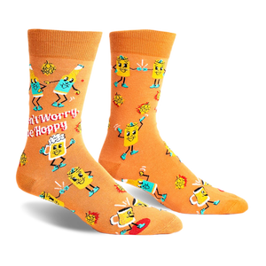 front view of a pair of orange socks with a pattern of cartoon beer mugs with arms and legs. the text 