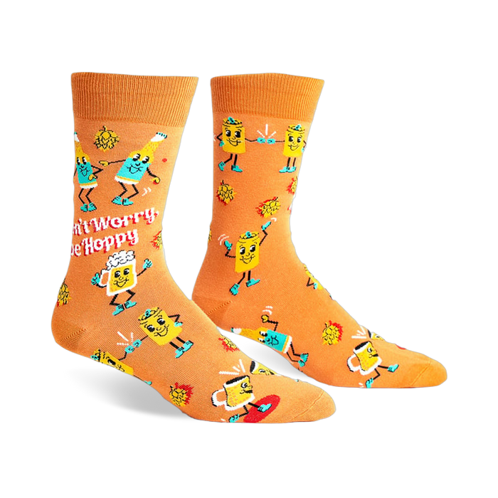Crew socks in orange with a fun design featuring dancing beer bottles, hops, and the phrase 'Don't Worry, Be Hoppy'.